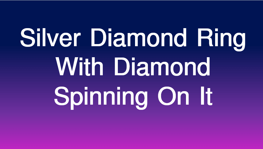 Silver Diamond Ring With Diamond Spinning on it